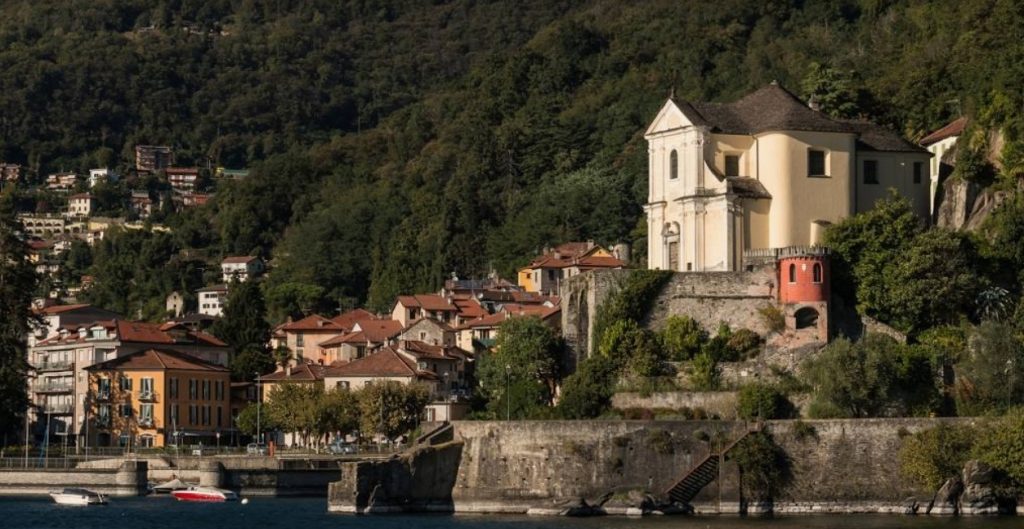Lakeside view with buildings